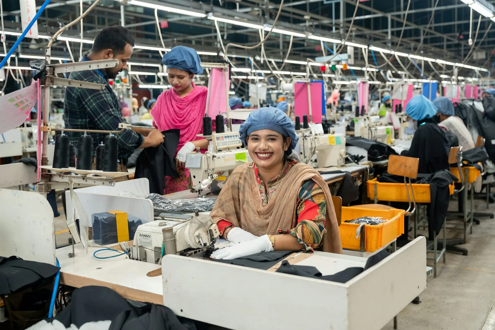 Garment workers on a ready-made garment production floor in Bangladesh